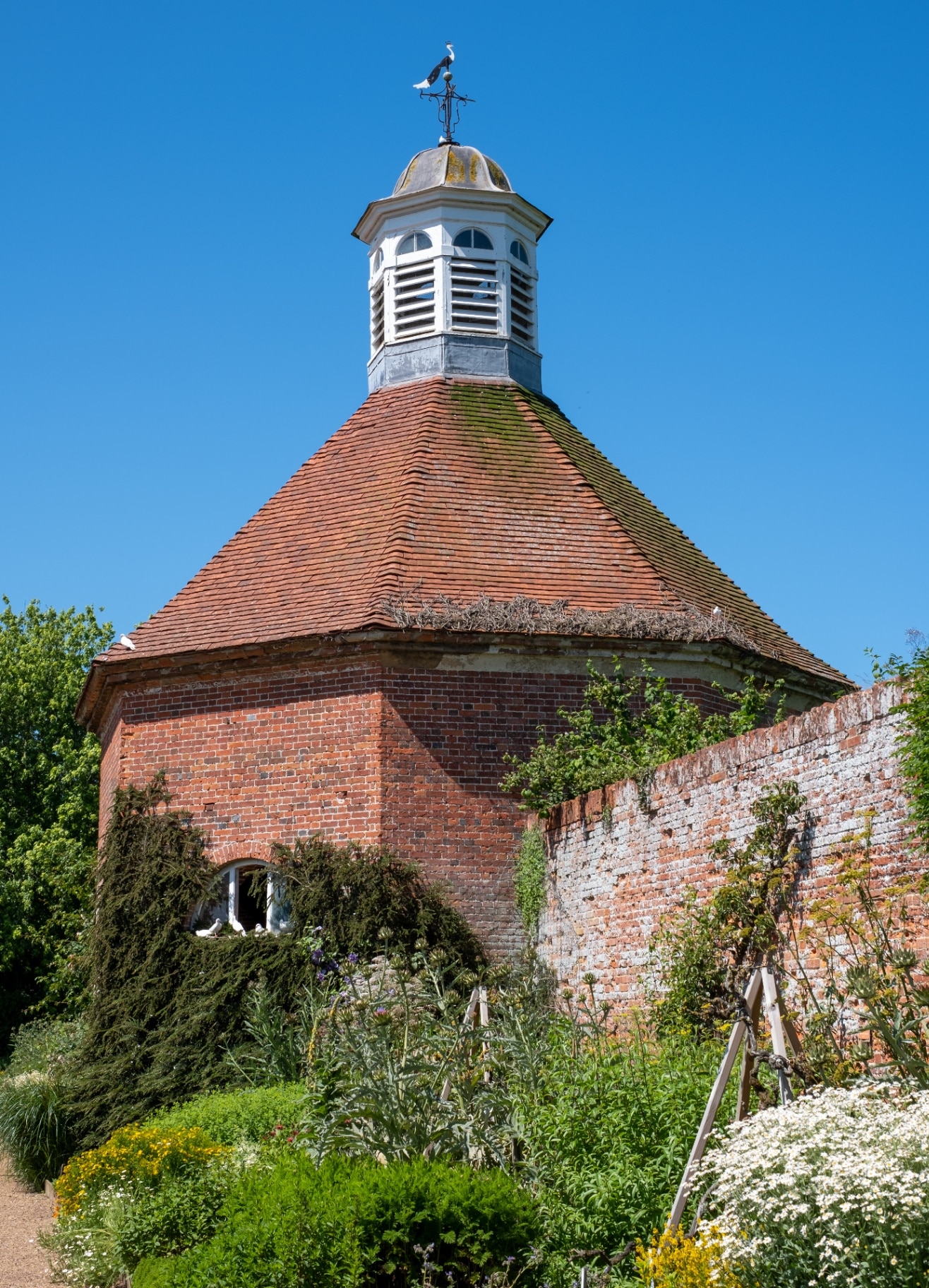 Norfolk UK. July 2021. Historic octagonal dovecote in the walled garden at Felbrigg Hall near Cromer in North Norfolk. East Anglia.