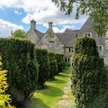 A driveway lined with Yew trees in Gloucestershire 