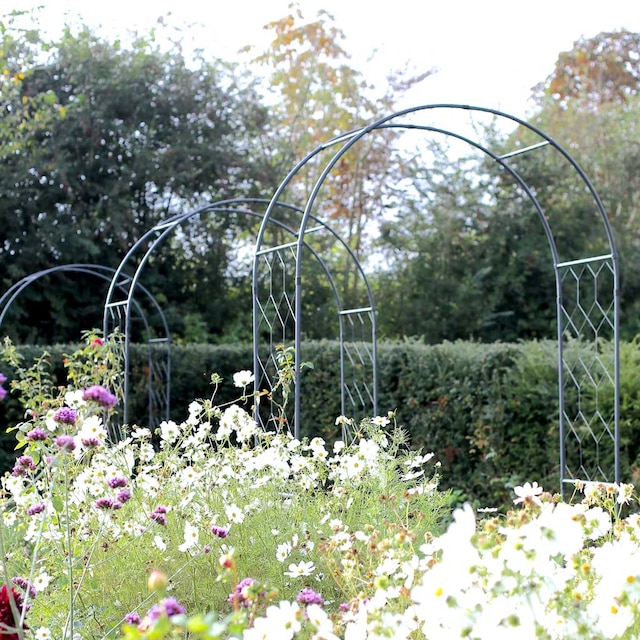Round arch in country garden